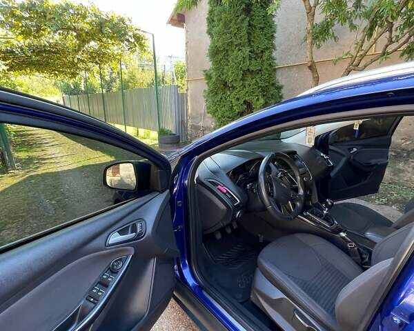 Синій Форд Фокус, об'ємом двигуна 1.5 л та пробігом 144 тис. км за 11500 $, фото 13 на Automoto.ua