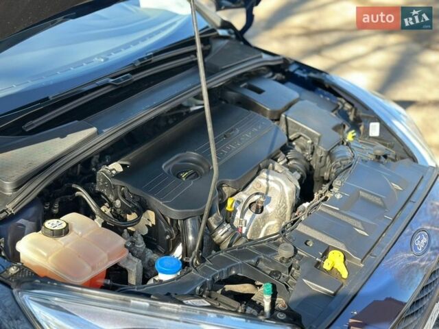 Синій Форд Фокус, об'ємом двигуна 1.5 л та пробігом 210 тис. км за 10300 $, фото 30 на Automoto.ua