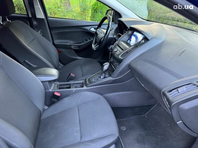 Синій Форд Фокус, об'ємом двигуна 1.5 л та пробігом 190 тис. км за 10940 $, фото 22 на Automoto.ua