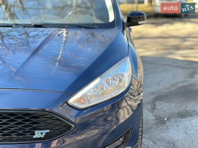 Синій Форд Фокус, об'ємом двигуна 1.5 л та пробігом 210 тис. км за 10300 $, фото 19 на Automoto.ua