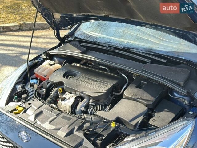 Синій Форд Фокус, об'ємом двигуна 1.5 л та пробігом 210 тис. км за 10300 $, фото 29 на Automoto.ua