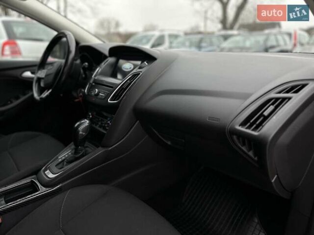 Синий Форд Фокус, объемом двигателя 1.5 л и пробегом 195 тыс. км за 10333 $, фото 18 на Automoto.ua