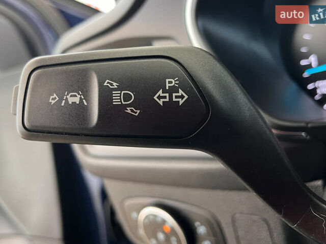 Синій Форд Фокус, об'ємом двигуна 1.5 л та пробігом 229 тис. км за 12650 $, фото 18 на Automoto.ua