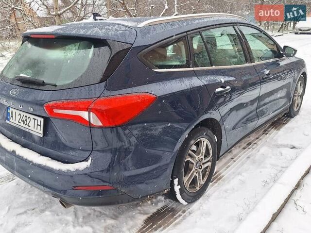 Синий Форд Фокус, объемом двигателя 1.5 л и пробегом 221 тыс. км за 14750 $, фото 23 на Automoto.ua