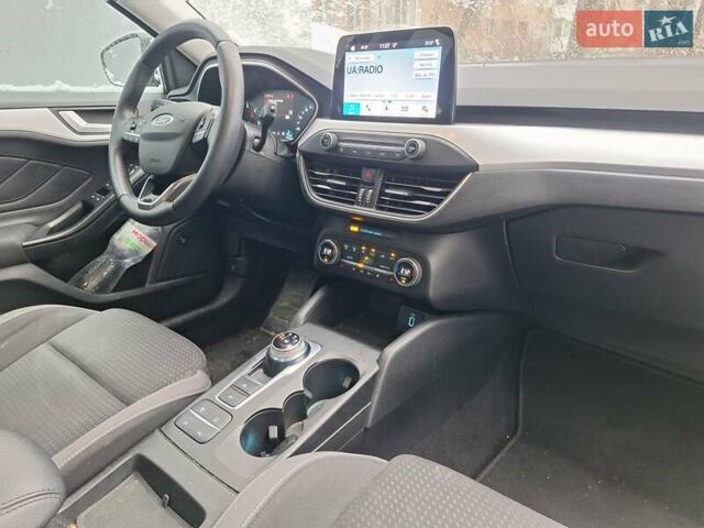 Синий Форд Фокус, объемом двигателя 1.5 л и пробегом 221 тыс. км за 14750 $, фото 21 на Automoto.ua