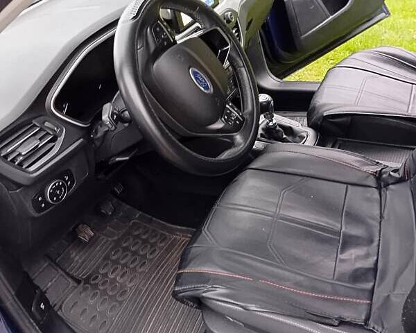 Синій Форд Фокус, об'ємом двигуна 1.5 л та пробігом 283 тис. км за 15169 $, фото 6 на Automoto.ua