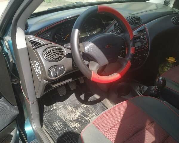 Зеленый Форд Фокус, объемом двигателя 1.4 л и пробегом 46 тыс. км за 3000 $, фото 4 на Automoto.ua