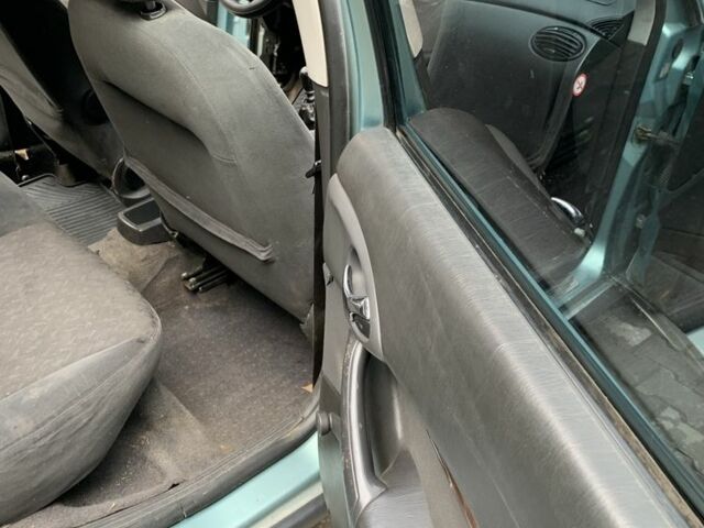 Зеленый Форд Фокус, объемом двигателя 1.8 л и пробегом 285 тыс. км за 999 $, фото 3 на Automoto.ua