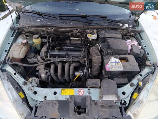 Зеленый Форд Фокус, объемом двигателя 1.4 л и пробегом 325 тыс. км за 2500 $, фото 7 на Automoto.ua