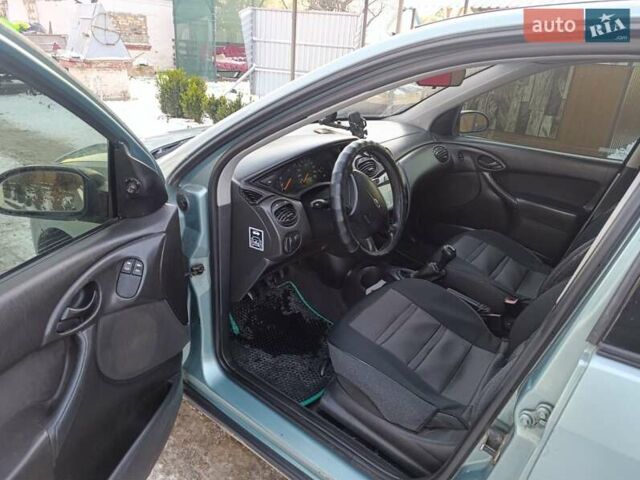 Зеленый Форд Фокус, объемом двигателя 1.4 л и пробегом 325 тыс. км за 2500 $, фото 4 на Automoto.ua