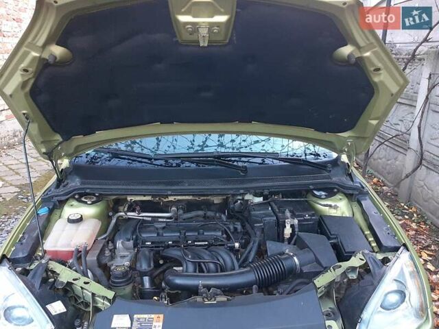 Зеленый Форд Фокус, объемом двигателя 1.6 л и пробегом 222 тыс. км за 4590 $, фото 28 на Automoto.ua