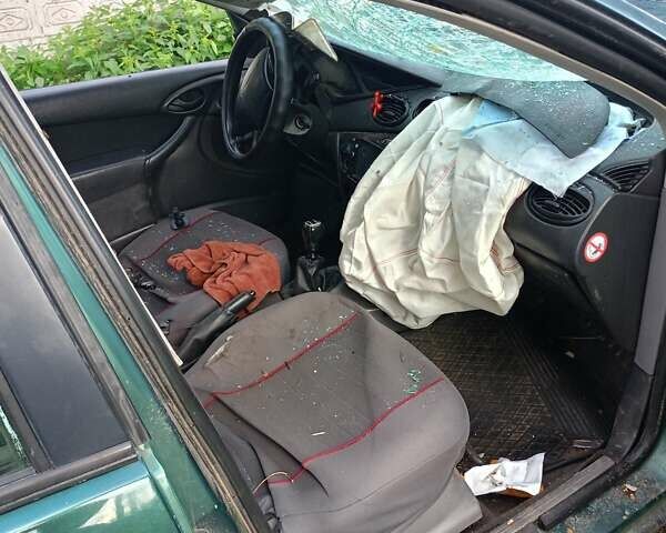 Зеленый Форд Фокус, объемом двигателя 1.8 л и пробегом 200 тыс. км за 500 $, фото 2 на Automoto.ua