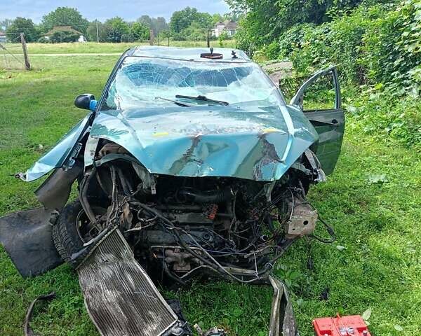 Зеленый Форд Фокус, объемом двигателя 1.8 л и пробегом 200 тыс. км за 500 $, фото 6 на Automoto.ua