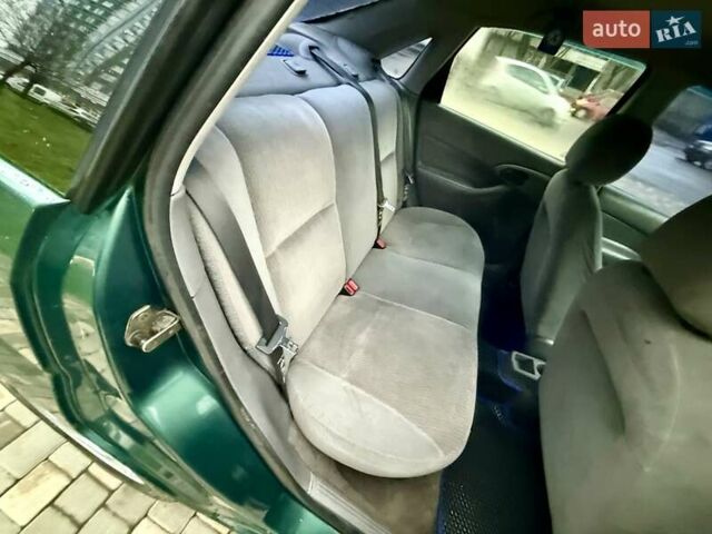 Зеленый Форд Фокус, объемом двигателя 2 л и пробегом 350 тыс. км за 2999 $, фото 57 на Automoto.ua