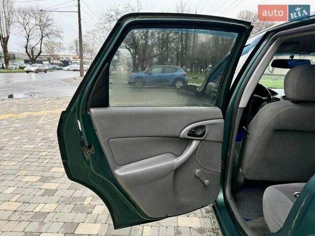 Зеленый Форд Фокус, объемом двигателя 2 л и пробегом 350 тыс. км за 2999 $, фото 60 на Automoto.ua