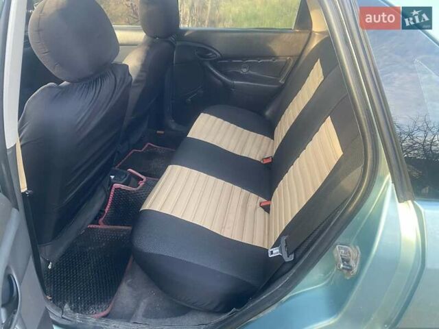 Зеленый Форд Фокус, объемом двигателя 1.6 л и пробегом 213 тыс. км за 2800 $, фото 7 на Automoto.ua