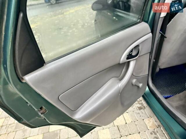 Зеленый Форд Фокус, объемом двигателя 2 л и пробегом 350 тыс. км за 2999 $, фото 59 на Automoto.ua