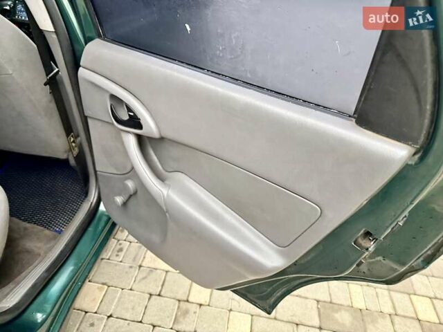 Зеленый Форд Фокус, объемом двигателя 2 л и пробегом 350 тыс. км за 2999 $, фото 53 на Automoto.ua