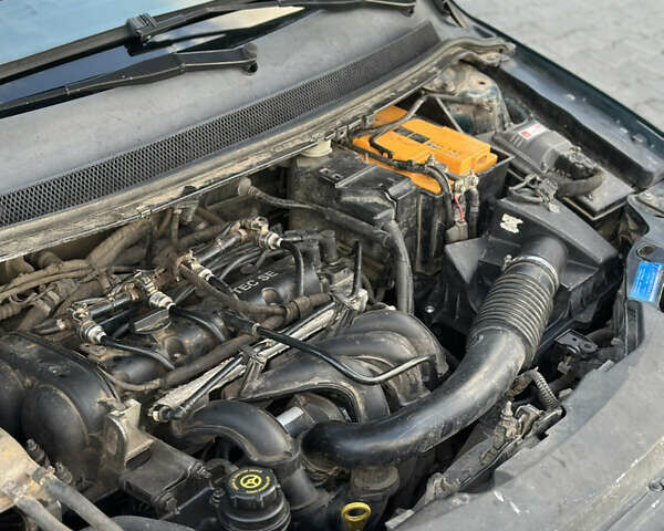 Зеленый Форд Фокус, объемом двигателя 1.6 л и пробегом 351 тыс. км за 2599 $, фото 11 на Automoto.ua