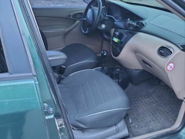 Зелений Форд Фокус, об'ємом двигуна 2 л та пробігом 193 тис. км за 2750 $, фото 4 на Automoto.ua