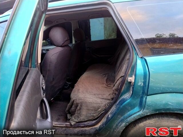 Зелений Форд Фокус, об'ємом двигуна 1.8 л та пробігом 430 тис. км за 1500 $, фото 3 на Automoto.ua