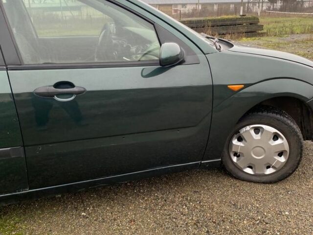 Зеленый Форд Фокус, объемом двигателя 1.8 л и пробегом 250 тыс. км за 2999 $, фото 6 на Automoto.ua