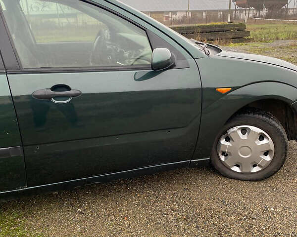 Зеленый Форд Фокус, объемом двигателя 1.8 л и пробегом 250 тыс. км за 2999 $, фото 7 на Automoto.ua