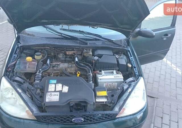 Зеленый Форд Фокус, объемом двигателя 1.8 л и пробегом 320 тыс. км за 2300 $, фото 14 на Automoto.ua