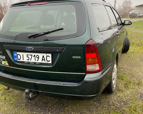 Зеленый Форд Фокус, объемом двигателя 1.8 л и пробегом 250 тыс. км за 2999 $, фото 8 на Automoto.ua