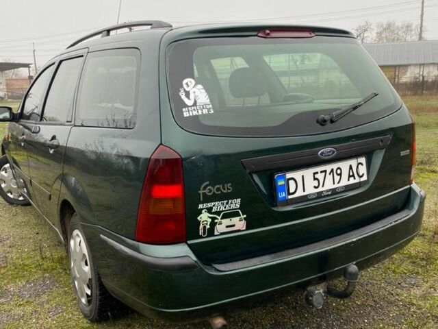 Зеленый Форд Фокус, объемом двигателя 1.8 л и пробегом 250 тыс. км за 2999 $, фото 7 на Automoto.ua