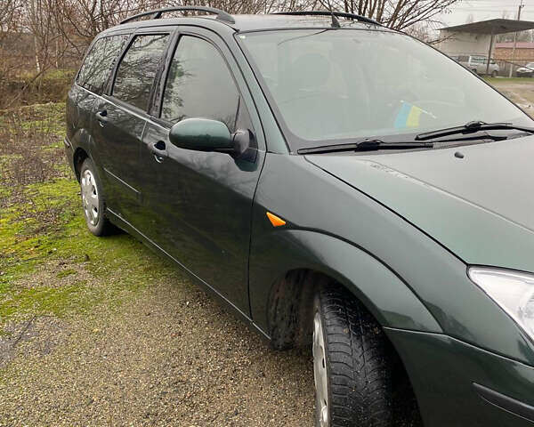 Зеленый Форд Фокус, объемом двигателя 1.8 л и пробегом 250 тыс. км за 2999 $, фото 5 на Automoto.ua