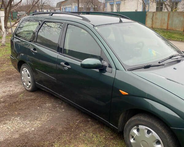 Зеленый Форд Фокус, объемом двигателя 1.8 л и пробегом 250 тыс. км за 2999 $, фото 12 на Automoto.ua