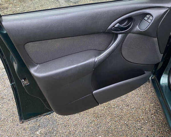 Зеленый Форд Фокус, объемом двигателя 1.8 л и пробегом 250 тыс. км за 2999 $, фото 15 на Automoto.ua