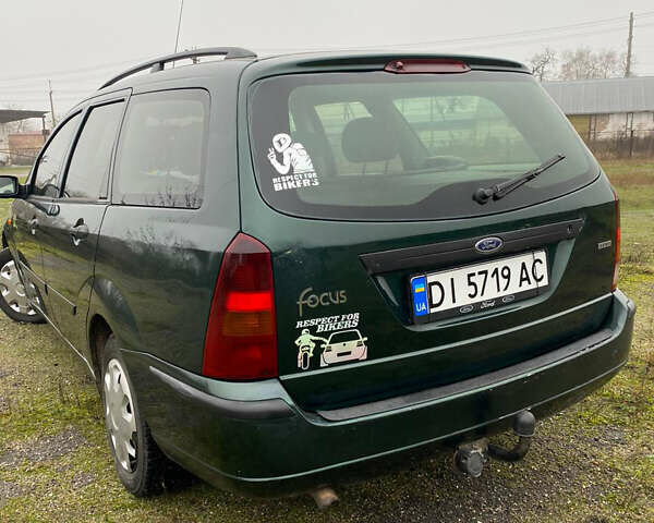 Зеленый Форд Фокус, объемом двигателя 1.8 л и пробегом 250 тыс. км за 2999 $, фото 3 на Automoto.ua