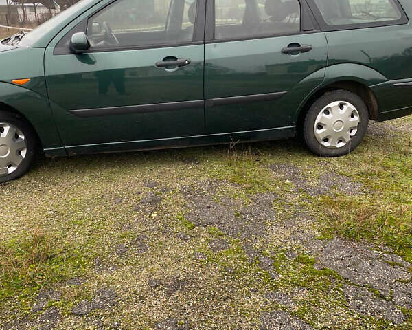 Зеленый Форд Фокус, объемом двигателя 1.8 л и пробегом 250 тыс. км за 2999 $, фото 2 на Automoto.ua