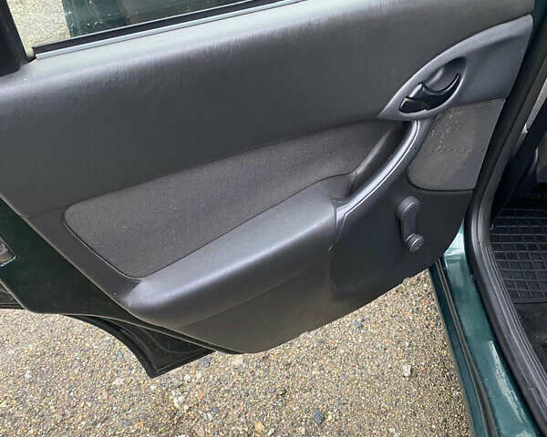 Зеленый Форд Фокус, объемом двигателя 1.8 л и пробегом 250 тыс. км за 2999 $, фото 17 на Automoto.ua