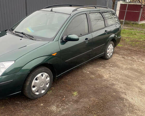 Зеленый Форд Фокус, объемом двигателя 1.8 л и пробегом 250 тыс. км за 2999 $, фото 11 на Automoto.ua