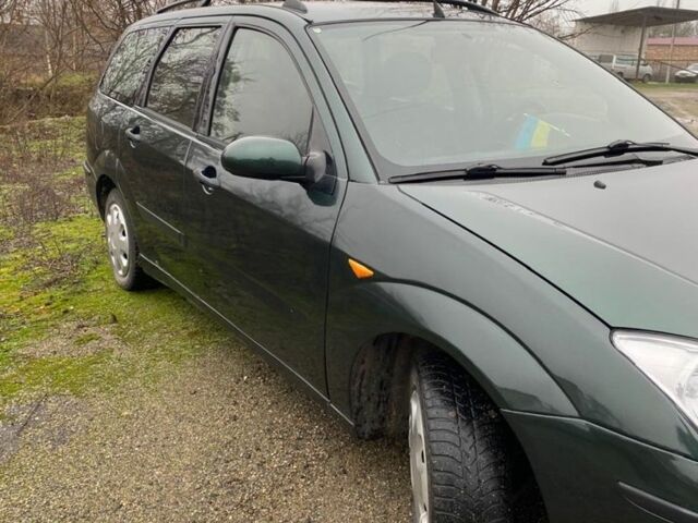 Зеленый Форд Фокус, объемом двигателя 1.8 л и пробегом 250 тыс. км за 2999 $, фото 4 на Automoto.ua