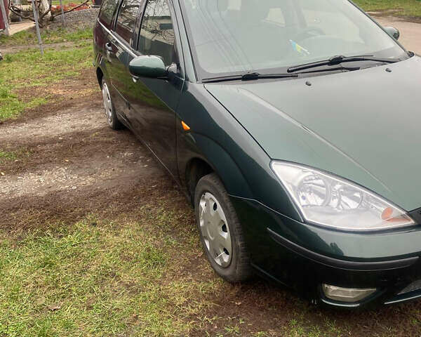 Зеленый Форд Фокус, объемом двигателя 1.8 л и пробегом 250 тыс. км за 2999 $, фото 9 на Automoto.ua