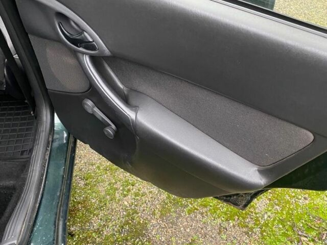 Зеленый Форд Фокус, объемом двигателя 1.8 л и пробегом 250 тыс. км за 2999 $, фото 17 на Automoto.ua