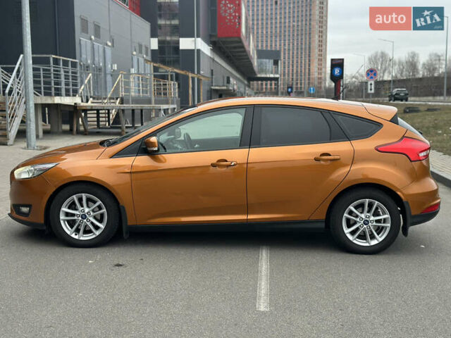 Помаранчевий Форд Фокус, об'ємом двигуна 1 л та пробігом 162 тис. км за 7999 $, фото 6 на Automoto.ua