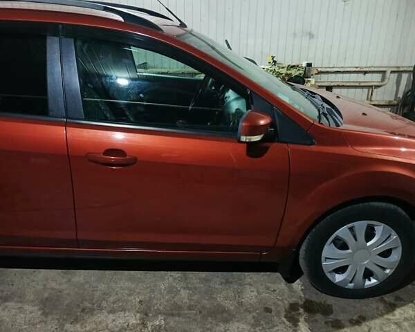 Оранжевый Форд Фокус, объемом двигателя 1.8 л и пробегом 300 тыс. км за 5600 $, фото 11 на Automoto.ua