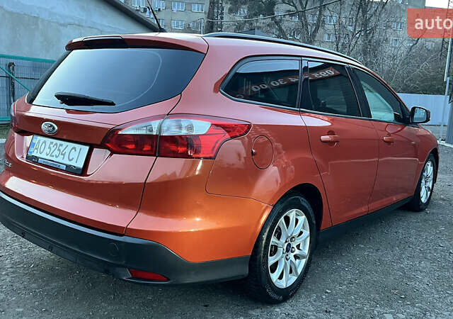 Помаранчевий Форд Фокус, об'ємом двигуна 1.6 л та пробігом 367 тис. км за 7400 $, фото 4 на Automoto.ua