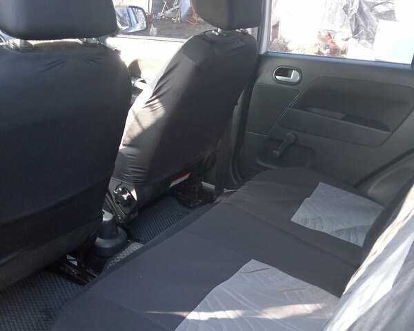 Білий Форд Фьюжен, об'ємом двигуна 1.39 л та пробігом 200 тис. км за 4700 $, фото 10 на Automoto.ua