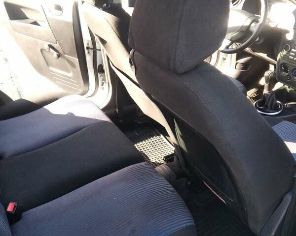 Белый Форд Фьюжн, объемом двигателя 1.39 л и пробегом 164 тыс. км за 4600 $, фото 13 на Automoto.ua