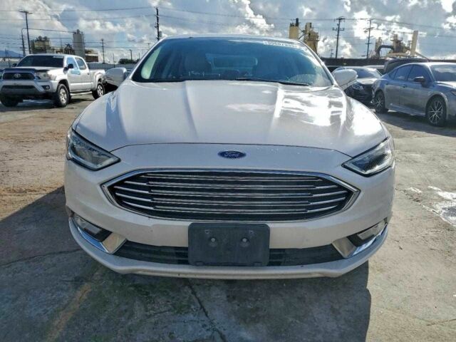 Белый Форд Фьюжн, объемом двигателя 2 л и пробегом 160 тыс. км за 2700 $, фото 4 на Automoto.ua