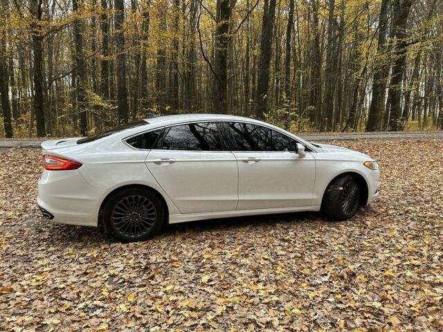 Білий Форд Фьюжен, об'ємом двигуна 2 л та пробігом 198 тис. км за 9600 $, фото 4 на Automoto.ua