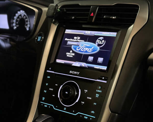 Білий Форд Фьюжен, об'ємом двигуна 1.6 л та пробігом 156 тис. км за 9400 $, фото 25 на Automoto.ua