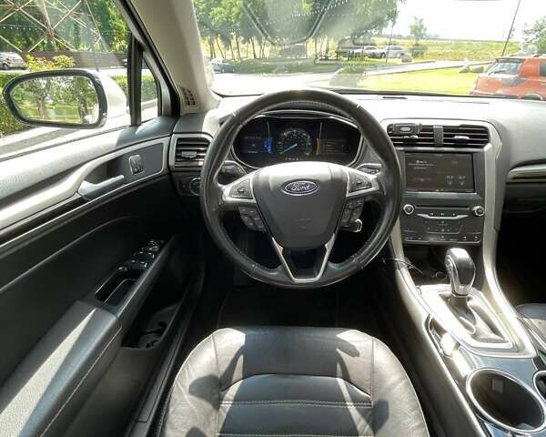 Білий Форд Фьюжен, об'ємом двигуна 2 л та пробігом 168 тис. км за 12300 $, фото 7 на Automoto.ua