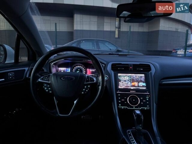 Білий Форд Фьюжен, об'ємом двигуна 2 л та пробігом 195 тис. км за 10690 $, фото 13 на Automoto.ua